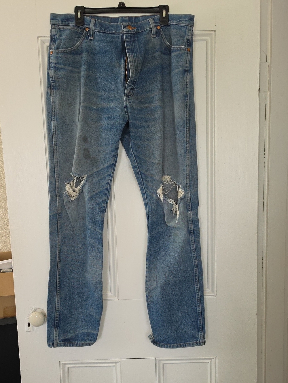 Wrangler Light Blue Bootcut Jeans with Knee Rips